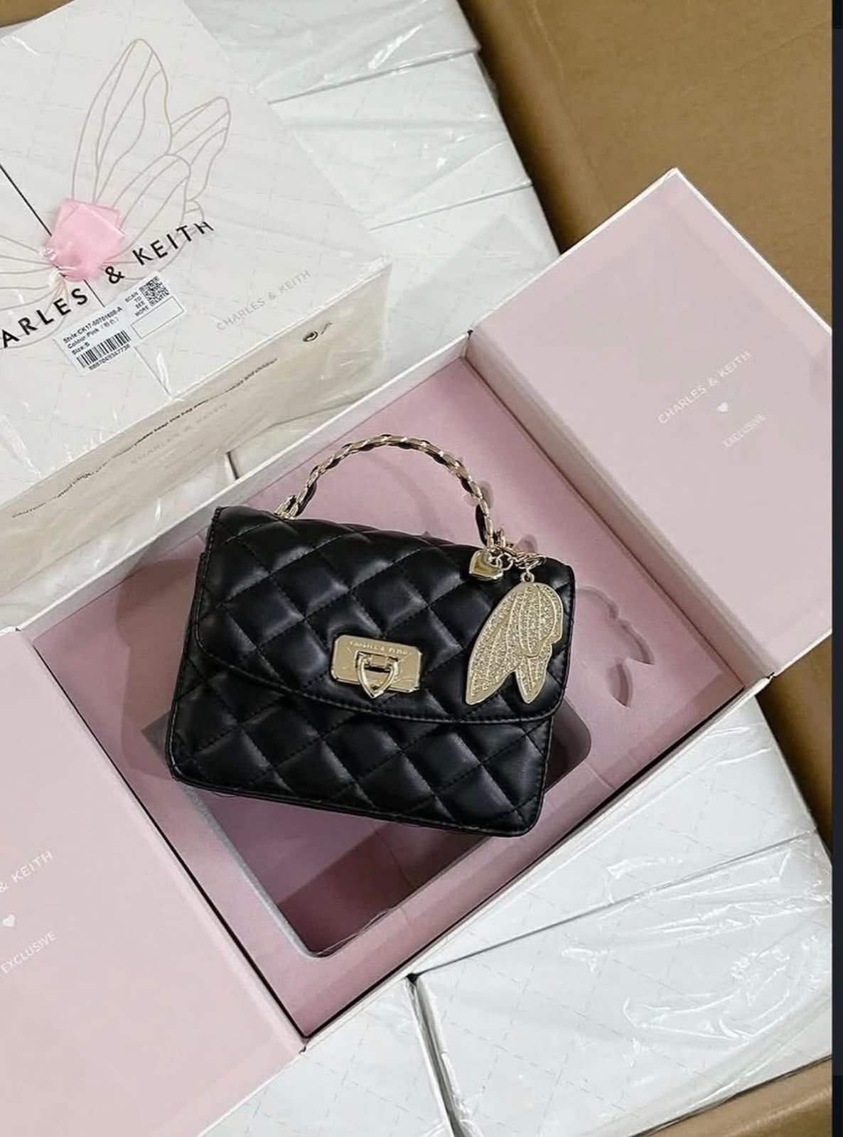 CHARLES & KEITH | Cressida Quilted Top Handle Bag With Bag Charms