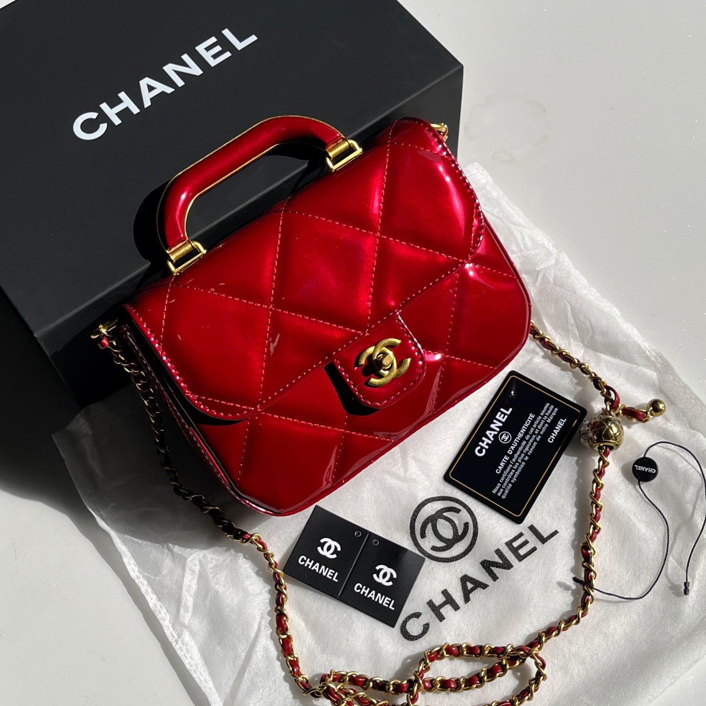 CHANEL | Metallic Mirror Calfskin Large Top Handle Clutch With Chain